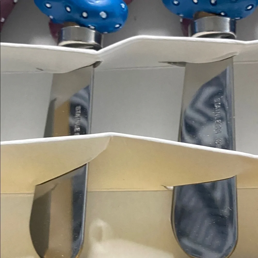 Marketplace Blue and Gold Cheese Spreaders. Set of 4. In Original Box. Like Nee.
